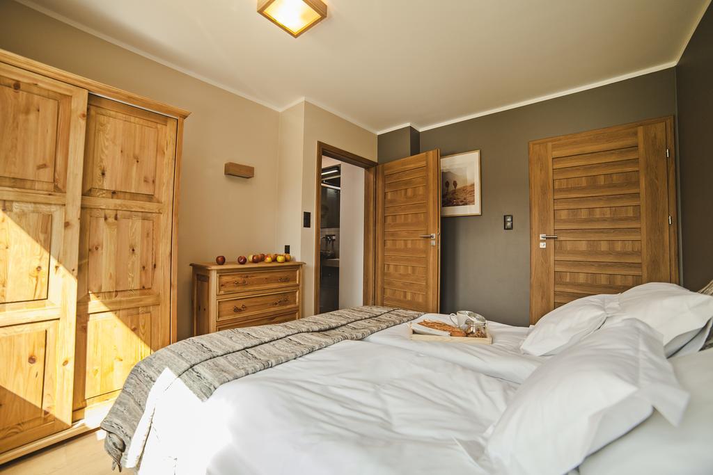 Aspen Deluxe Residence & Aspen Cottage Międzybrodzie Bialskie Rum bild